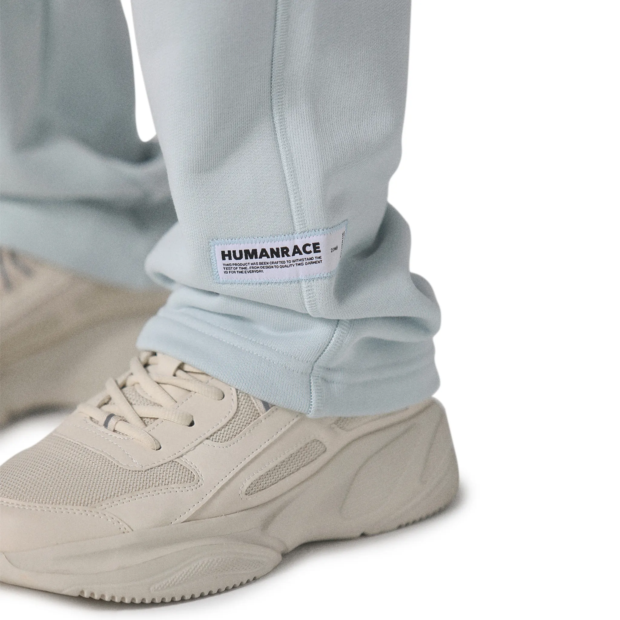 Leg view of Human Race Mars Straight Leg Soft Blue Sweatpants